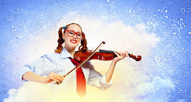 istock Young woman violinist 180940722