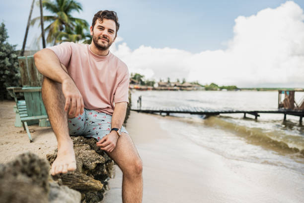 Portrait of a young man on the beach