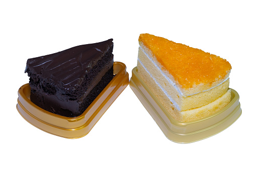 Chocolate cake and orange cake that people like to eat in their free time. They are arranged on a white background which is easy to distinguish.