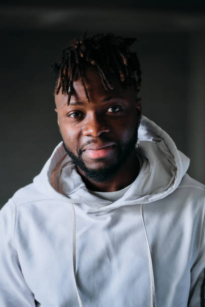 istock Smiling cheerful man in hoodie looking at camera 1809426866