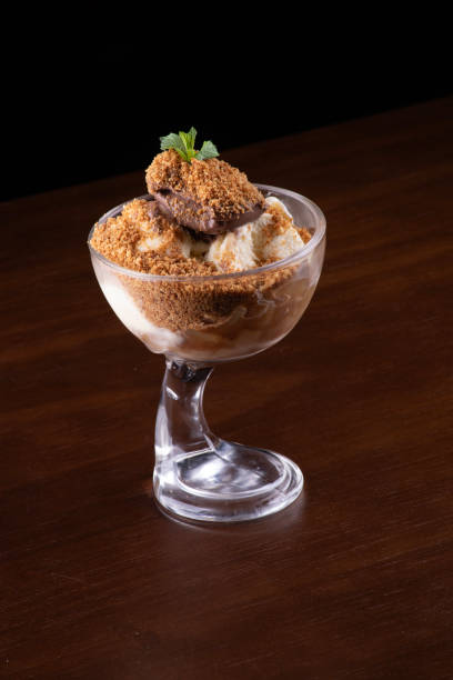 istock ice cream dessert cup apple pie and hazelnut cream with peanuts isolated angle 1809431390