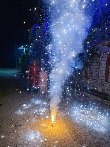 Stock photo showing lit ground fountain fire used as part of Diwali, the Indian traditional festival of lights.
