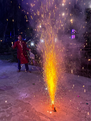Stock photo showing lit ground fountain fire used as part of Diwali, the Indian traditional festival of lights.