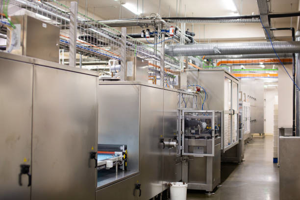 istock Sweets factory. Sweets production process. Conveyor belt with sweets on it. 1809457633