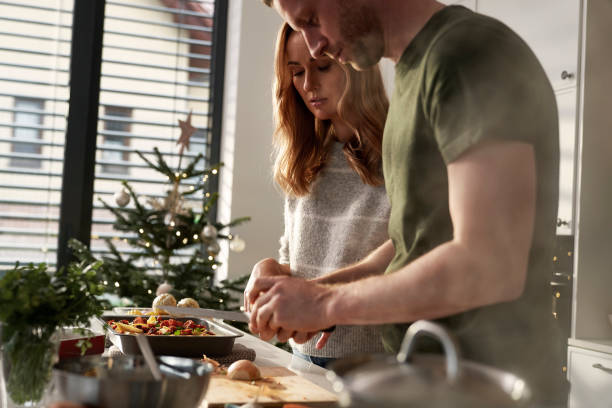 istock Caucasian couple preparing food before Christmas 1809459959