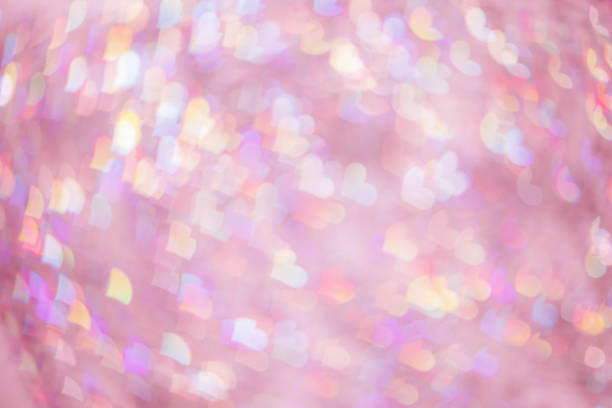 istock Abstract blurred background with pink pastel colored hearts, color gradient photo, blurred lights as hearts bokeh, romantic holiday, valentine Day festive wallpaper. Glittering aesthetic backdrop 1809461099