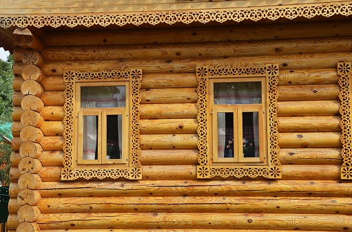 Abandoned old wooden log cabin building