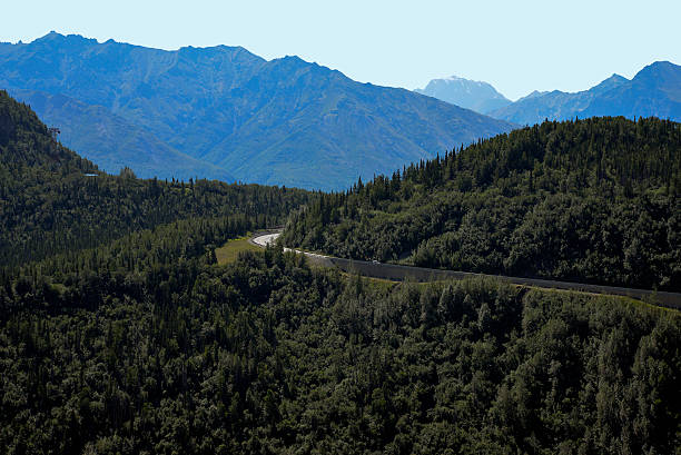The scenic Glenn Highway as it cuts through the mountainous land of Alaska