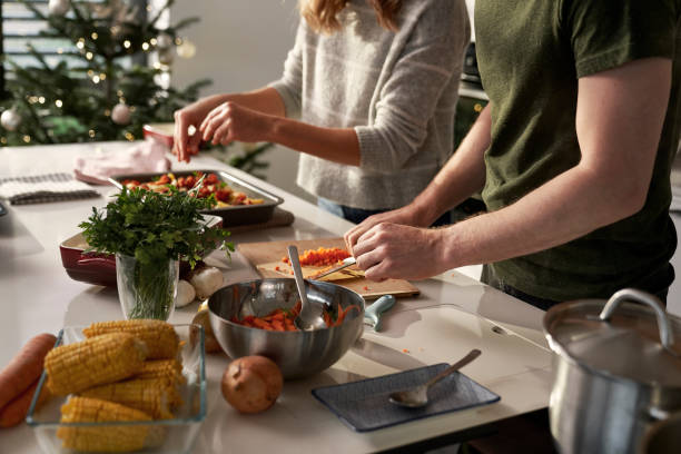 istock Unrecognizable caucasian couple cooking together before Christmas 1809468620