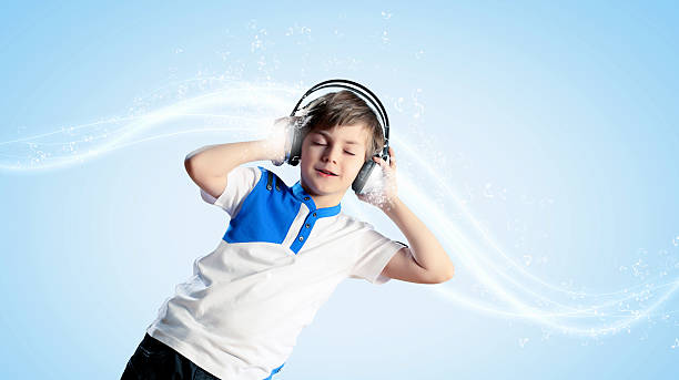 istock Little boy in headphones 180948643