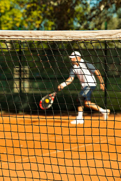 istock Focus on the tennis net 180948725