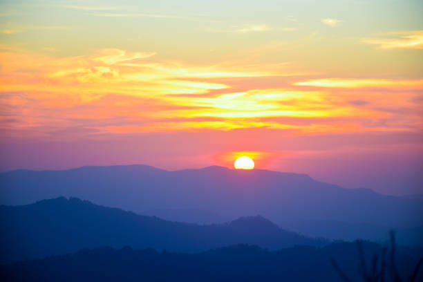 istock sunset on top of the mountain 1809490420