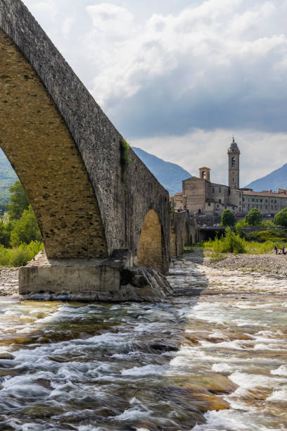 istock Gobbo Bridge also Devil Bridge or Ponte del Diavolo or Ponte Gobbo in Bobbio, Piacenza province, Trebbia Valley, Emilia Romagna, Italy 1809490422