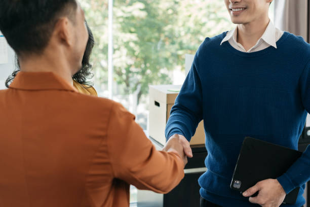 istock Businessmen shake hands after agreeing to start a new project successfully. 1809495320