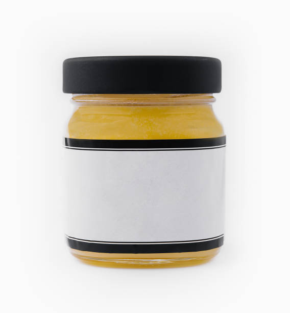 istock Ghee butter in a glass jar isolated on white 1809500736