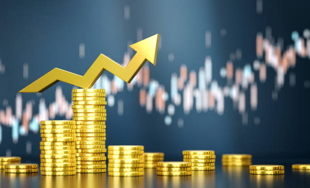 istock Success Arrow On Top Of Coin Stacks Before Blue Financial Graph 1809543679