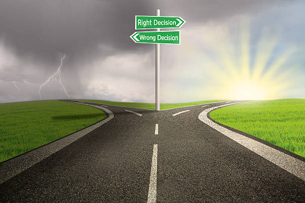 istock Road sign of right vs wrong decision 180956100