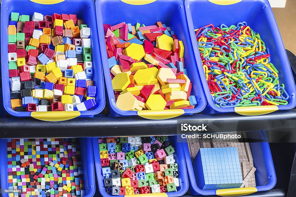 Educational Blocks Large bins of educational and building blocks used in a classroom. Baby - Human Age Stock Photo