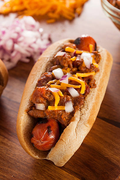 istock Homemade Hot Chili Dog with Cheddar Cheese 180956648
