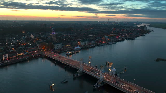 Kampen sunset view at the city bridge over the river IJssel