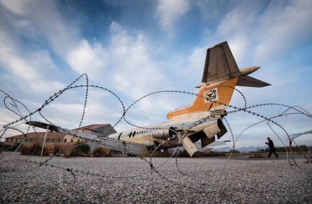 Nicosia, Cyprus, November 21 2016: Abandoned destroyed airplane and metal fence at Nicosia abandoned airport, cyprus