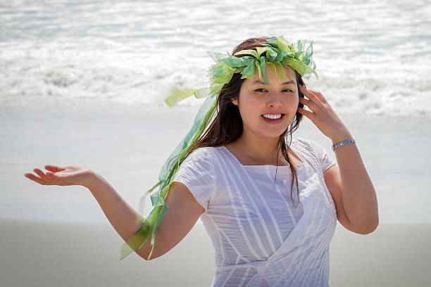 istock Young asian woman on the beach 180957813