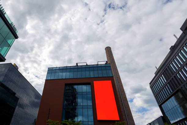 istock Blank billboard sign mockup in the urban environment, on the facade 1809586353