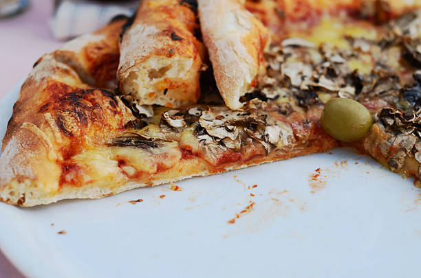 Pizza served on the table in restaurant