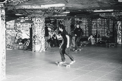 September 21, 2022: Street photo of young boys skating in a skatepark in London (riverbank skatepark)