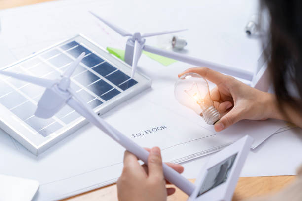 istock Solar energy panel and light bulb, green energy concept 1809614229
