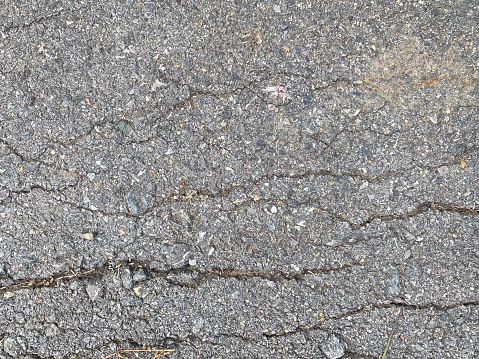 Old Road with cracks texture background