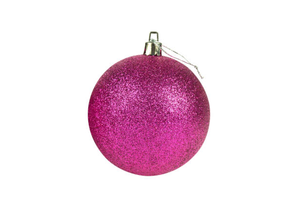 istock One pink glittered Christmas tree ball isolated on white background 1809640593