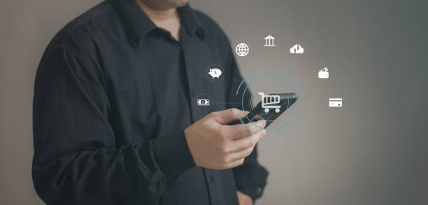 Concept e banking or e commerce : business man using his mobile formaking a payment or transferring money or conducting a financial transaction by wallet technology by application smartphone. concepto de banca electrónica o comercio electrónico: hombre de negocios que utiliza su teléfono móvil para realizar un pago o transferir dinero o realizar una transacción financiera mediante tecnología de billetera mediante la aplicación de un tel�