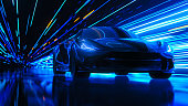 3D Car Model: Sports Car Driving at on a Road on High Speed, Racing Through the Colorful Dark Tunnel With Lights Reflecting Everywhere. Dark Supercar Driving Fast on Highway. VFX on Image.