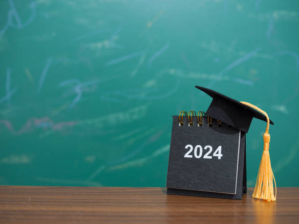 istock Study goals, 2024 Desk calendar with graduation hat. The concept for Resolution, Goal, Action, Planning, and manage time to success graduate. 1809645833