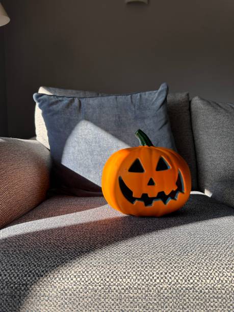 istock Halloween pumpkin in the house 1809648044