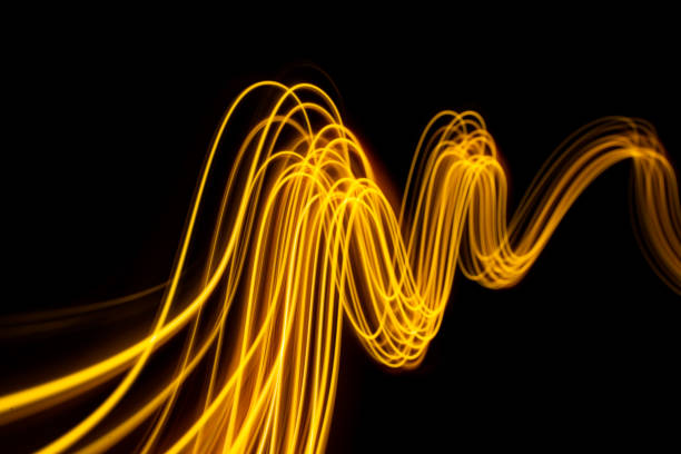 istock Abstract modern banner design. Glowing warm lines on black background. 1809671899