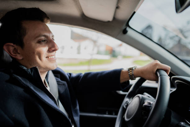 istock Young businessman driving car 1809676737