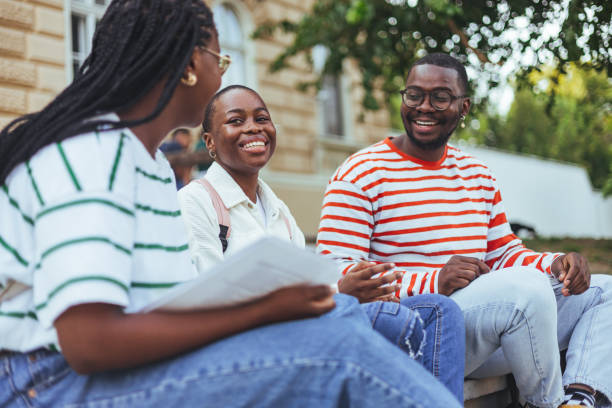 istock Happy multiethnic group of students smiling outdoor. 1809679400