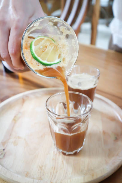 istock lemon tea ,honey tea , peach tea or mango tea or fruit tea or pouring tea 1809681023