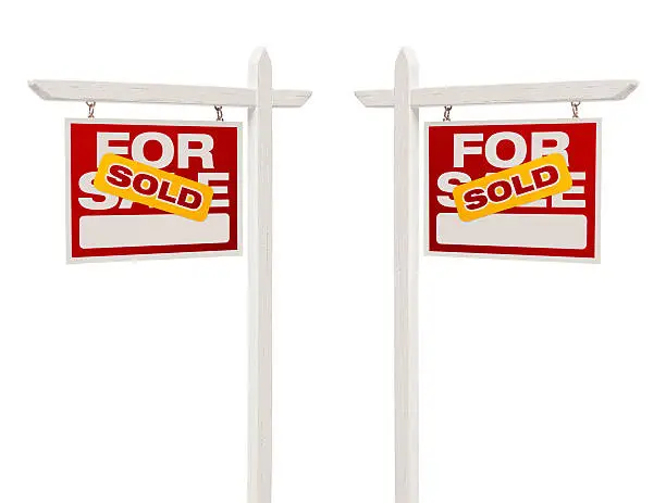 Pair of Left and Right Facing Sold For Sale Real Estate Signs With Clipping Path Isolated on White.
