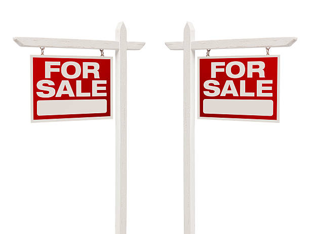 Pair of For Sale Real Estate Signs With Clipping Path Pair of Left and Right Facing For Sale Real Estate Signs With Clipping Path Isolated on White. house for sale sign stock pictures, royalty-free photos & images