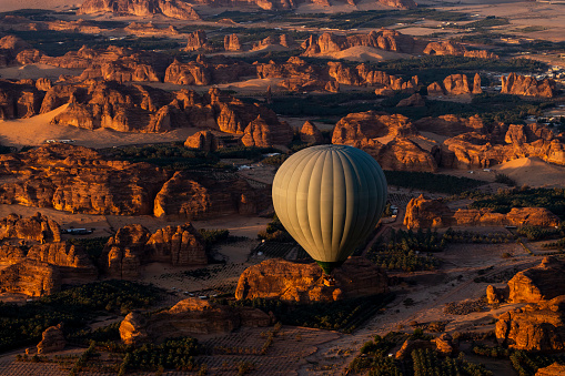 Hot air balloons taking off at dawn for balloon safaris in the Masai Mara, Kenya