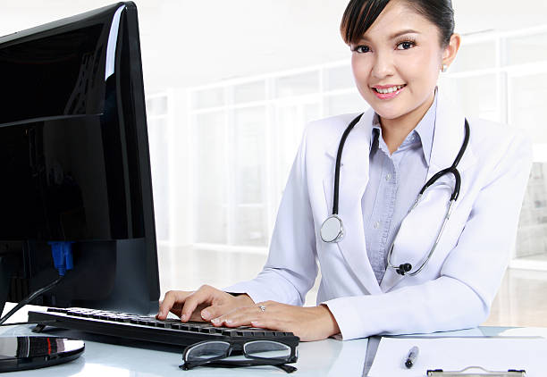 istock doctor woman sitting on her office 180970251