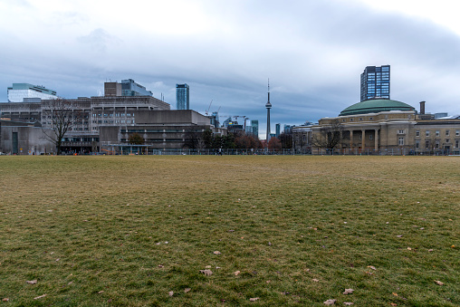 Toronto Ontario, Canada- November 22nd, 2023: A landscape view of University of Toronto with the CN Tower.