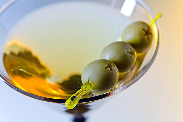 martini with green olives