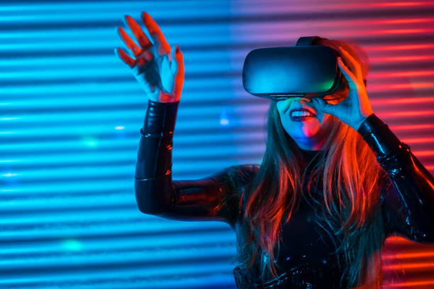 istock Happy woman using Virtual reality goggles in a futuristic space 1809724387