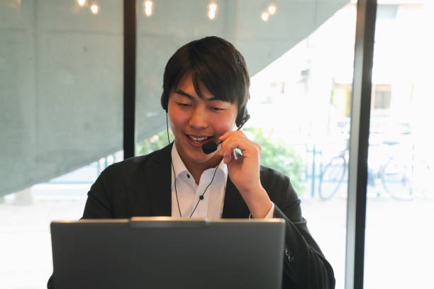 istock Male customer service agent helping to support his customers 1809727729