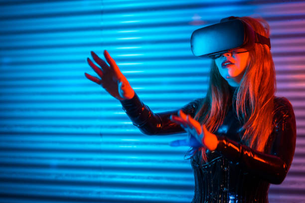 istock Amazed futuristic woman using Virtual reality goggles 1809729395