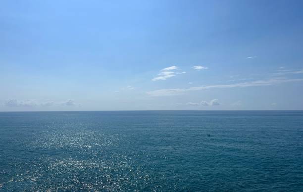 istock Blue sea glittering water, clear sky, horizon. 1809746750